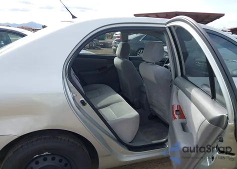 2004 Toyota Corolla Le z USA, uszkodzony, nr VIN JTDBR32E642043194